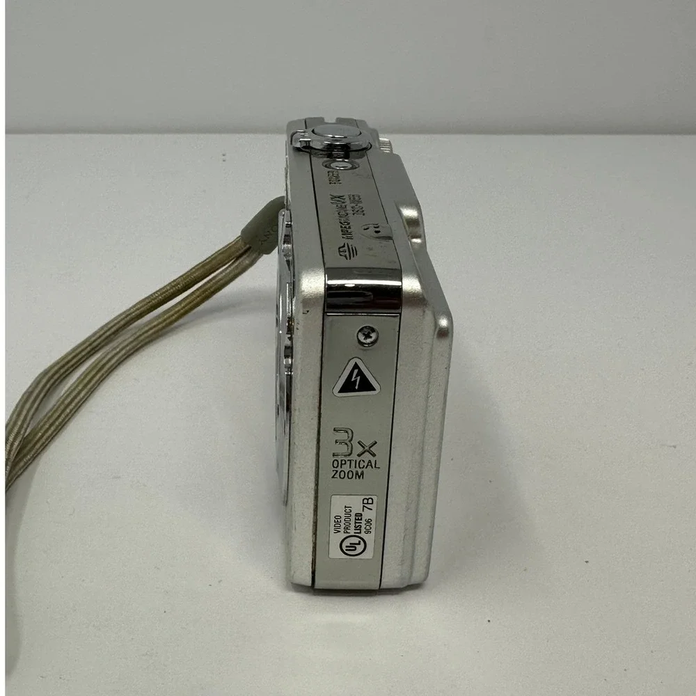 Sony Cyber-shot DSC-W55 Silver 7.2MP Digital Camera and Accessories B0